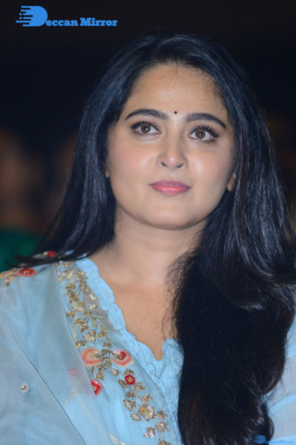 Telugu Actress Anushka Shetty in a blue dress attending a movie event