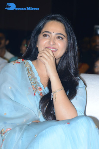 Telugu Actress Anushka Shetty in a blue dress attending a movie event