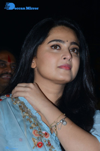 Telugu Actress Anushka Shetty in a blue dress attending a movie event