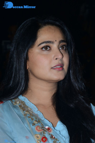 Telugu Actress Anushka Shetty in a blue dress attending a movie event