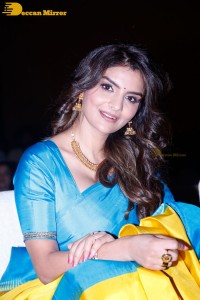 Actress Anveshi Jain in a blue and yellow saree