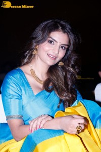 Actress Anveshi Jain in a blue and yellow saree