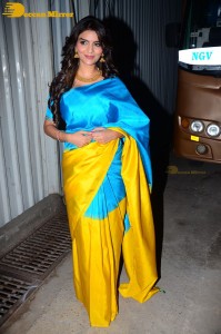 Actress Anveshi Jain in a blue and yellow saree