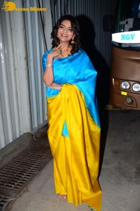 Actress Anveshi Jain in a blue and yellow saree