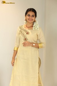 actress aparna janardanan cute looks in a light yellow salwar kameez