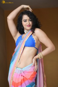 actress Apsara Rani sexy photoshoot in a white and blue saree