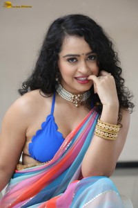 actress Apsara Rani sexy photoshoot in a white and blue saree