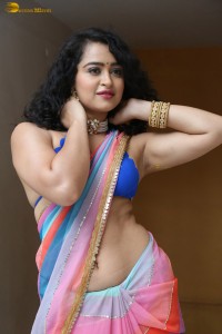 actress Apsara Rani sexy photoshoot in a white and blue saree