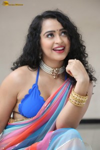 actress Apsara Rani sexy photoshoot in a white and blue saree