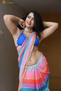 actress Apsara Rani sexy photoshoot in a white and blue saree