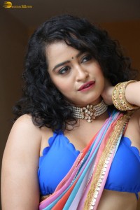 actress Apsara Rani sexy photoshoot in a white and blue saree