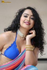 actress Apsara Rani sexy photoshoot in a white and blue saree