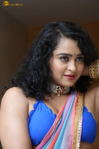 actress Apsara Rani sexy photoshoot in a white and blue saree