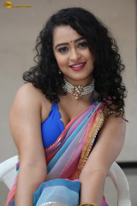 actress Apsara Rani sexy photoshoot in a white and blue saree
