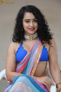 actress Apsara Rani sexy photoshoot in a white and blue saree