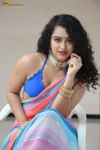 actress Apsara Rani sexy photoshoot in a white and blue saree
