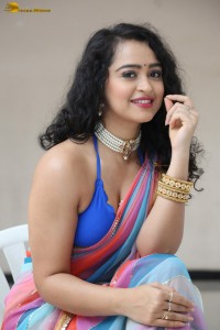 actress Apsara Rani sexy photoshoot in a white and blue saree