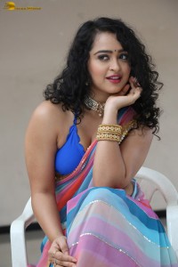 actress Apsara Rani sexy photoshoot in a white and blue saree