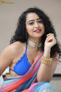 actress Apsara Rani sexy photoshoot in a white and blue saree