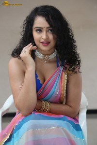 actress Apsara Rani sexy photoshoot in a white and blue saree