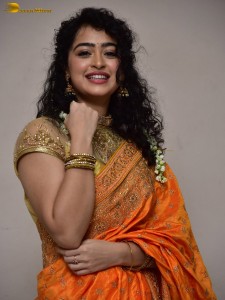 actress Apsara Rani red-hot looks in a orange saree
