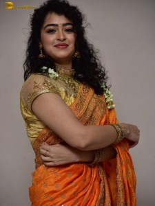 actress Apsara Rani red-hot looks in a orange saree
