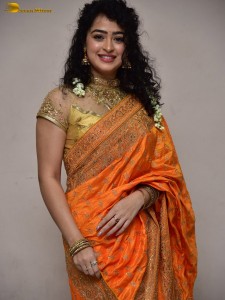 actress Apsara Rani red-hot looks in a orange saree