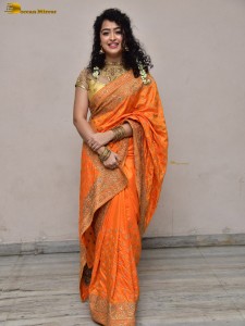 actress Apsara Rani red-hot looks in a orange saree