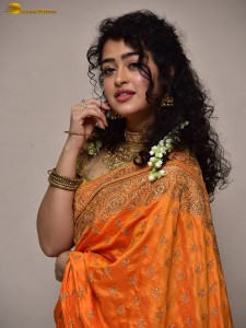 actress Apsara Rani red-hot looks in a orange saree