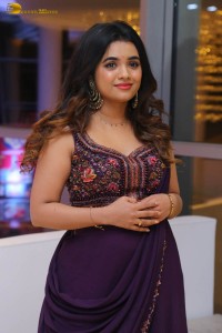 Indian Actress Mishti Chakraborty cute in a dark purple lehenga choli