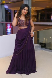 Indian Actress Mishti Chakraborty cute in a dark purple lehenga choli