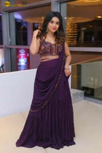 Indian Actress Mishti Chakraborty cute in a dark purple lehenga choli