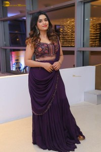 Indian Actress Mishti Chakraborty cute in a dark purple lehenga choli