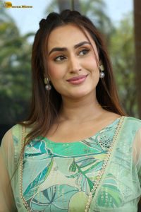 actress archana iyer beautiful in a green dress