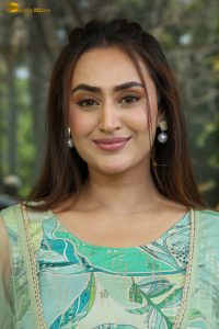 actress archana iyer beautiful in a green dress