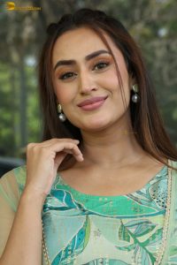 actress archana iyer beautiful in a green dress