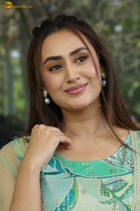 actress archana iyer beautiful in a green dress