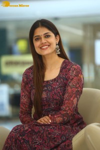 Actress Asha Bhat photoshoot in a brownish red dress