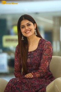 Actress Asha Bhat photoshoot in a brownish red dress