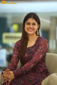 Actress Asha Bhat photoshoot in a brownish red dress