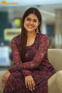 Actress Asha Bhat photoshoot in a brownish red dress