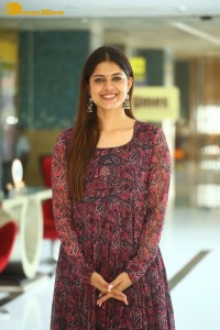 Actress Asha Bhat photoshoot in a brownish red dress