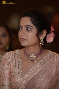actress ashika ranganath in a pink saree while attending a function