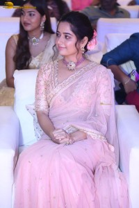 actress ashika ranganath in a pink saree while attending a function