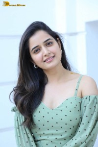 actress ashika ranganath in a green top