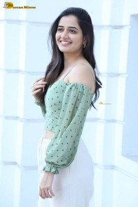 actress ashika ranganath in a green top