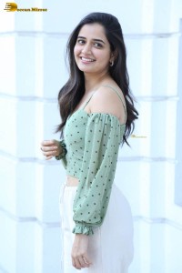 actress ashika ranganath in a green top