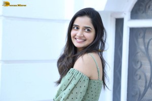 actress ashika ranganath in a green top