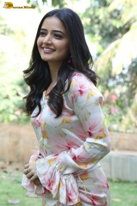 actress ashika ranganath in a white floral dress