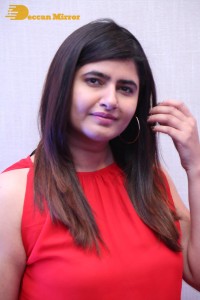 Ashima Narwal in a Red Dress